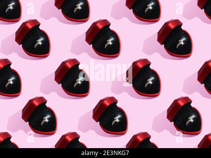Seamless pattern with red ring box on pink Stock Photo