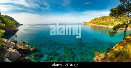 Coastline at Mediterranean sea near Fethiye Kabak Turkey. Warm sea, resort, relaxation, healthy lifestyle, hiking tour. Stock Photo