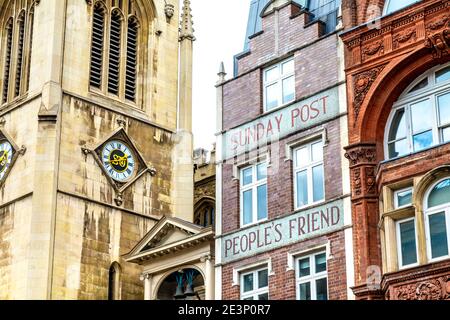 The Sunday Post building in Fleet Street next to St-Dunstan-in-the-West church, London, UK Stock Photo