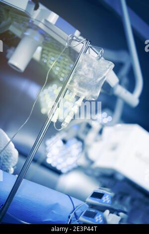 Medical system on a medical pole in the operating room on the background of surgical equipment. Stock Photo