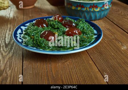 Khoresh alou esfenaj -  traditional Iranian spinach and dried plum stew Stock Photo