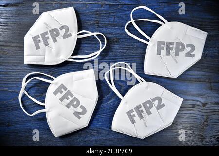 FFP2 face masks on a desk Stock Photo
