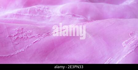 Delicate pink background from silk organza with embroidery. Stock Photo