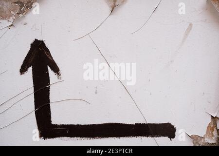 Hand painted black color arrow showing up, copy space Stock Photo