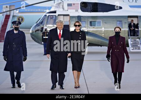 Joint Base Andrews, United States. 20th Jan, 2021. U.S. President Donald Trump, left, and U.S. First Lady Melania Trump arrive to a farewell ceremony at Joint Base Andrews, Maryland on Wednesday, January 20, 2021. Trump departs Washington with Americans more politically divided and more likely to be out of work than when he arrived, while awaiting trial for his second impeachment - an ignominious end to one of the most turbulent presidencies in American history. Photo by Stefani Reynolds/UPI Credit: UPI/Alamy Live News