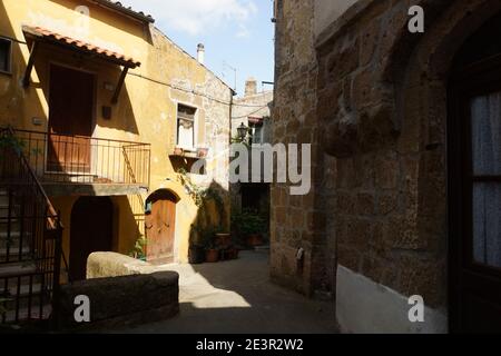 Street in the old historical tourist town of Pitigliano. Pitigliano, province of Grosseto, Italy, Tuscany. Stock Photo