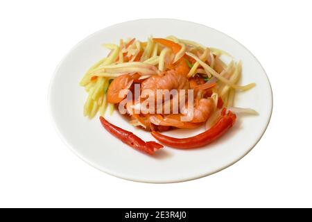 spicy dried shrimp with slice mango fruit salad on plate Stock Photo