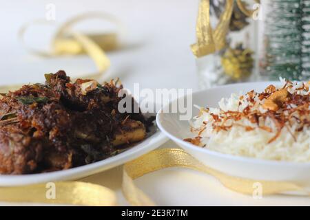 Mutton ghee roast. Goat meat fry with potatoes, also known as Mutton ...