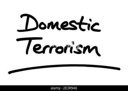 Domestic Terrorism, handwritten on a white background. Stock Photo