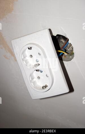 Electrical installation and repairs, installing new power points Stock Photo