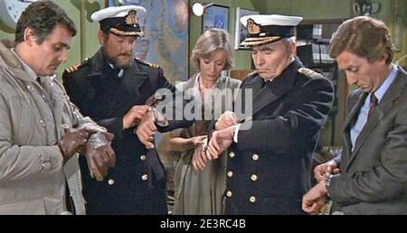 NORTH SEA HIJACK aka Assault Force aka ffolkes 1980 Universal/CIC film with Roger Moore second from left and Faith Brook next to James Mason Stock Photo