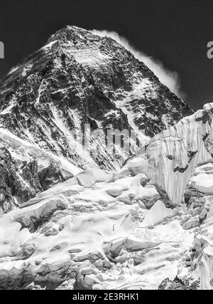 Nepal. Himalayan mountains in monochrome in the Sagarmatha National Park of the Solu Khumbu valley of Mount Everest in Nepal, With Mount Everest also known as Chomolongma, seen here from above Gorak Shep and the Everest mountaineering base camp. Stock Photo