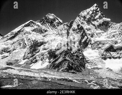 Nepal. Himalayan mountains in monochrome in the Sagarmatha National Park of the Solu Khumbu valley of Mount Everest in Nepal, With Mount Everest also known as Chomolongma and neighbour Lhotse seen here from above Gorak Shep and the Everest mountaineering base camp. Stock Photo