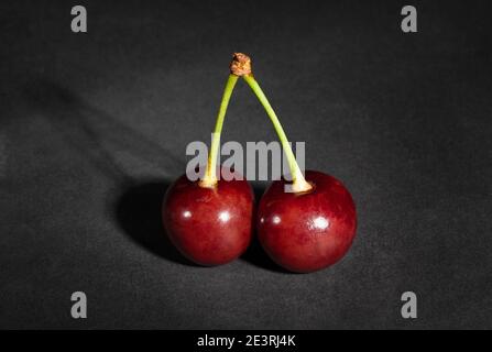 sour cherry on black background Stock Photo