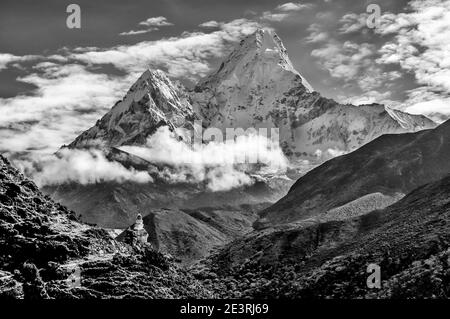 Nepal. Himalayan mountains in monochrome in the Sagarmatha National Park of the Solu Khumbu valley of Mount Everest in Nepal, With the world famous Ama Dablam mountain seen here from near Thyangboche Monastery en-route to Gorak Shep and Everest mountaineering base camp. Stock Photo