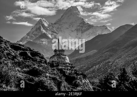 Nepal. Himalayan mountains in monochrome in the Sagarmatha National Park of the Solu Khumbu valley of Mount Everest in Nepal, With the world famous Ama Dablam mountain seen here from near Thyangboche Monastery en-route to Gorak Shep and Everest mountaineering base camp. Stock Photo