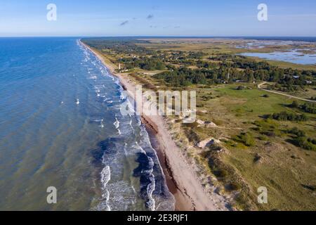 Aerial view of Pape between Baltic sea and Lake Pape. Blue sky. Pape lighthouse Stock Photo