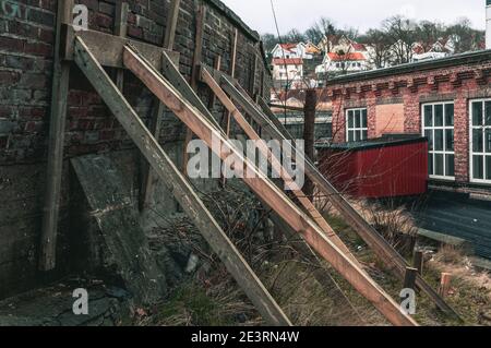 Props supporting old brick wall Stock Photo