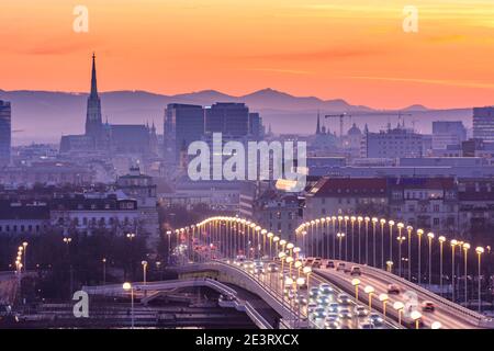 Wien, Vienna: Vienna city center, river Donau (Danube), bridge Reichsbrücke, cathedral Stephansdom (St. Stephen's Cathedral) in 00. overview, Wien, Au Stock Photo