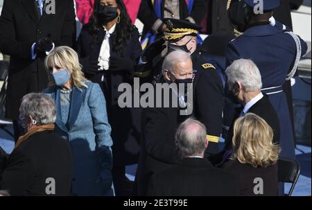 Washington, United States. 20th Jan, 2021. Former President Bill Clinton greets President Joe Biden after his inauguration as the 46th President of the United States at the Capitol in Washington, DC on Wednesday, January 20, 2021. Photo by Pat Benic/UPI Credit: UPI/Alamy Live News Stock Photo