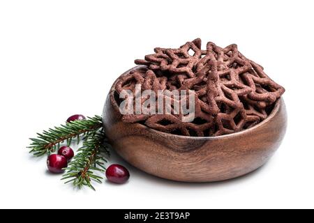 Chocolate  pretzel shapes in wooden bowl isolated on white Stock Photo