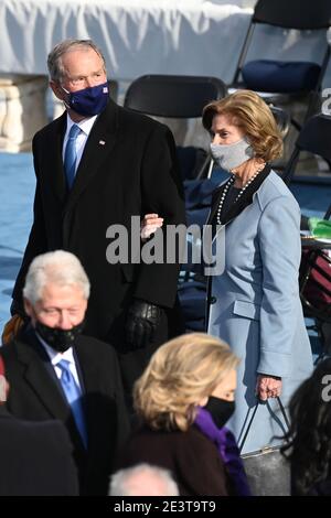 Former US President George W Bush (Top, L), Laura Bush (Top, R) and Former US Presiednt Bill Clinton (Low, L) with Secretary of State Hillary Clinton (Low, R) are seen before US president-elect Joe Biden is sworn in as the 46th US President on January 20, 2021, at the US Capitol in Washington, DC. Biden, a 78-year-old former vice president and longtime senator, takes the oath of office on the US Capitol's western front, the very spot where pro-Trump rioters clashed with police two weeks ago before storming Congress in a deadly insurrection. Pool Photo by Saul LOEB/UPI Stock Photo