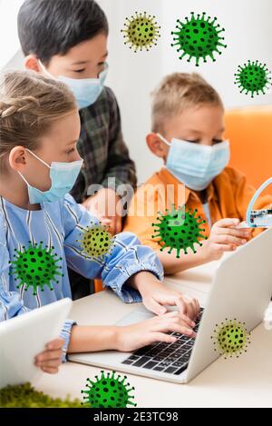 multicultural children in medical masks using gadgets while programming robot in stem school, bacteria illustration Stock Photo