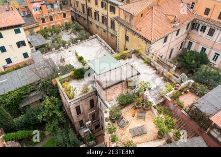 Aerial view looking down onto rooftops and roof garden terraces in Trastevere, Rome, Italy Stock Photo