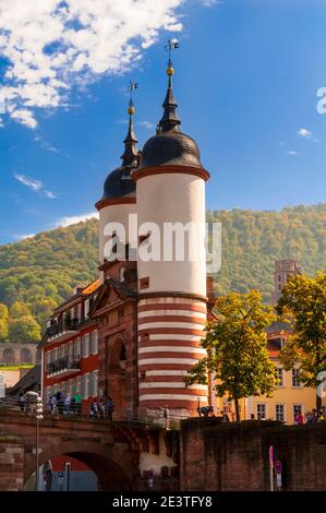 The towers of the bridge gate on the Alte Brücke (old bridge) in Heidelberg, Baden-Württemberg, Germany. September. Stock Photo