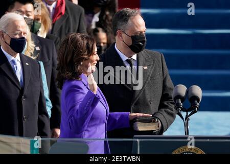 Kamala Harris is sworn in as vice president by Supreme Court Justice Sonia Sotomayor as her husband Doug Emhoff holds the Bible during the 59th Presidential Inauguration at the U.S. Capitol in Washington, Wednesday, Jan. 20, 2021. (AP Photo/Patrick Semansky, Pool)/MediaPunch Stock Photo