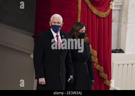 Washington, United States. 20th Jan, 2021. U.S. Vice President Mike Pence and Second Lady Karen Pence arrive to the 59th presidential inauguration in Washington, DC, U.S., on Wednesday, Jan. 20, 2021. Biden will propose a broad immigration overhaul on his first day as president, including a shortened pathway to U.S. citizenship for undocumented migrants - a complete reversal from Donald Trump's immigration restrictions and crackdowns, but one that faces major roadblocks in Congress. Photo by Kevin Dietsch/UPI Credit: UPI/Alamy Live News