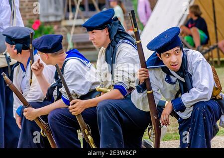 Civil War reenactors represent the Union Army at Fort Gaines during a reenactment of the 150th Battle of Mobile Bay in Dauphin Island, Alabama. Stock Photo