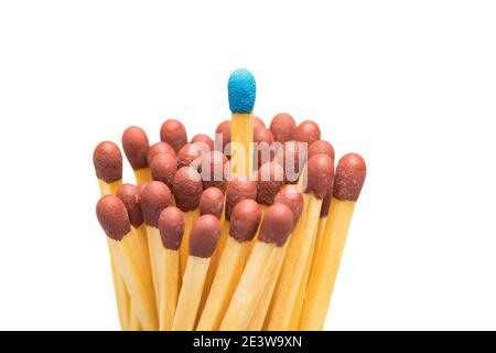 Comparison, differentiation and USP. One match standing out from the crowd. Conceptual picture on isolated white background. Stock Photo