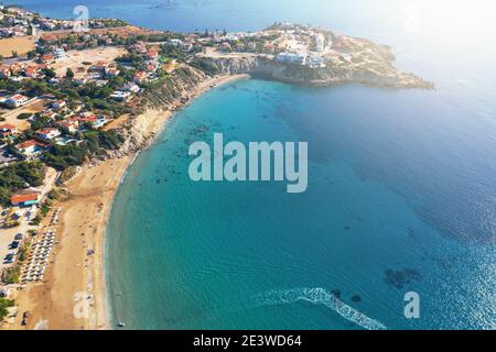 Aerial view of Cyprus lagoon sandy beach and blue sea water, tropical resort from above. Stock Photo