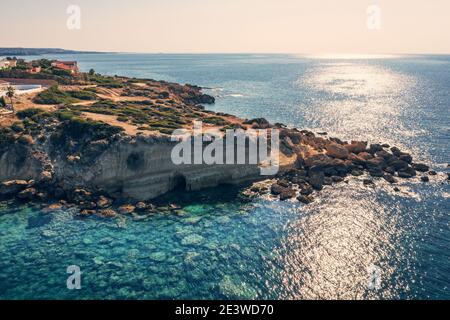 Aerial photo of beautiful tropical island coastline. Summer and travel vacation concept.