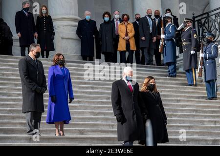 Vice President Kamala Harris, second from left and Second Gentleman Douglas Emhoff, left, send-off former Vice President Mike Pence, second from right, and his wife Karen Sue Pence, right, at the US Capitol in Washington, DC on Wednesday, January 20, 2021. Credit: Rod Lamkey/Pool via CNP | usage worldwide Stock Photo