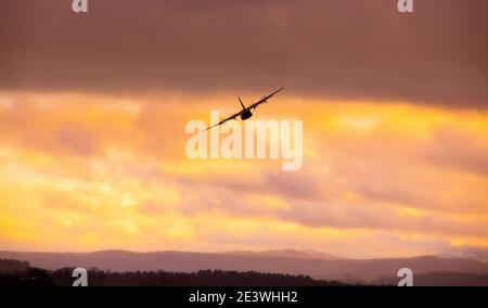 A C130J Hercules of the Royal Air Force at 500 ft over north Northumberland during a navigation exercise Stock Photo