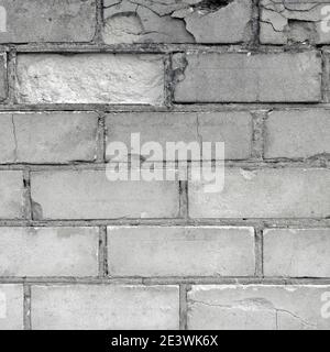 White light grey old aged weathered fine brick wall texture, grungy damaged calcium silicate bricks pattern detail background macro closeup, large Stock Photo