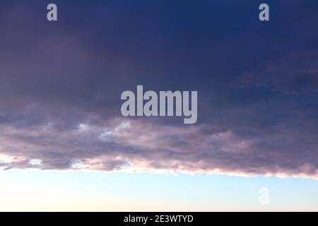 Dark low clouds over the horizon Stock Photo