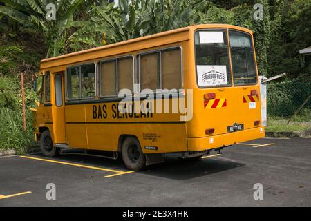 Kuala Lumpur, Malaysia - September 30, 2019: Mini school bus parked on the road side Stock Photo