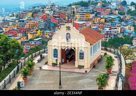 Cityscape of Santa Ana Hill Church with colorful colonial housing, Las Penas district, Guayaquil, Ecuador. Stock Photo