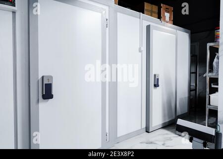 Refrigerator room door in professional kitchen in restaurant Stock Photo