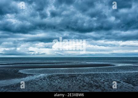 Severe storm with black clouds over the sea at Beachmere, Queensland, QLD, Australia Stock Photo