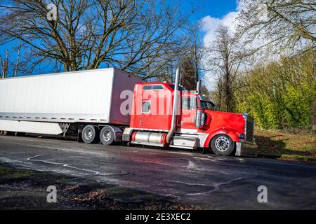 Red American Long Haul Big Rig Semi Truck With Accessories Stock