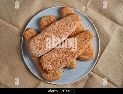 Frozen Alaska pollock fish fillets on a plate ready to be cooked Stock Photo