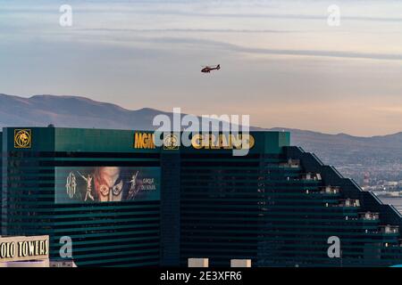 A helicopter flies over the MGM Grand in Las Vegas Stock Photo