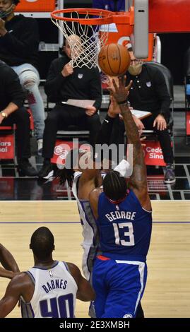 Los Angeles, United States. 20th Jan, 2021. Los Angeles Clippers' forward Paul George scores over Sacramento Kings' center Richaun Holmes during the third quarter at Staples Center in Los Angeles on Wednesday, January 20, 2021. The Clippers defeated the Kings 115-96. Photo by Jim Ruymen/UPI Credit: UPI/Alamy Live News Stock Photo