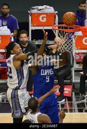 Los Angeles, United States. 20th Jan, 2021. Sacramento Kings' center Richaun Holmes blocks the shot of Los Angeles Clippers' power forward Serge Ibaka during the third quarter at Staples Center in Los Angeles on Wednesday, January 20, 2021. The Clippers defeated the Kings 115-96. Photo by Jim Ruymen/UPI Credit: UPI/Alamy Live News Stock Photo
