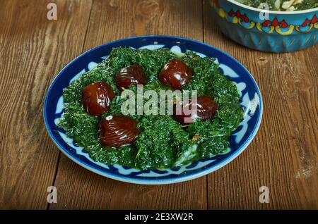 Khoresh alou esfenaj -  traditional Iranian spinach and dried plum stew Stock Photo