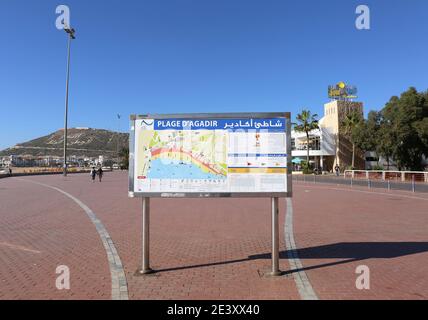 AGADIR,MOROCCO-DECEMBER 11:Agadir Bech Sign in French and Arabic with Map at Promenade.December 11,2015 in Agadir,Morocco. Stock Photo